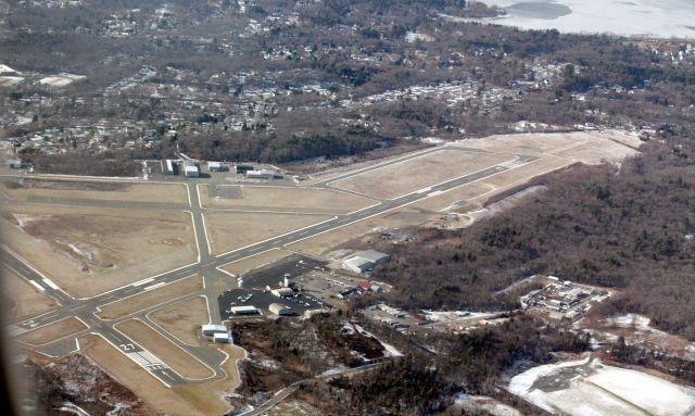 — — - Hanscom Airfield from the air