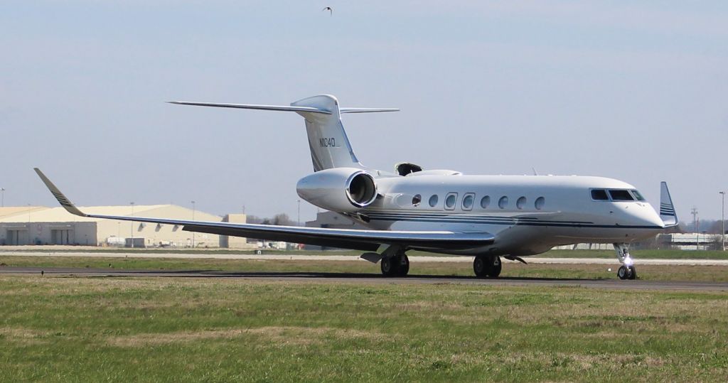 Gulfstream Aerospace Gulfstream G650 (N1040) - A Gulfstream Aerospace GVI (G650ER) taxiiing for takeoff at Carl T. Jones Field, Huntsville International Airport, AL - March 13, 2018. Photographed outside Gate 19 along the east taxiway fence along Boeing Circle.