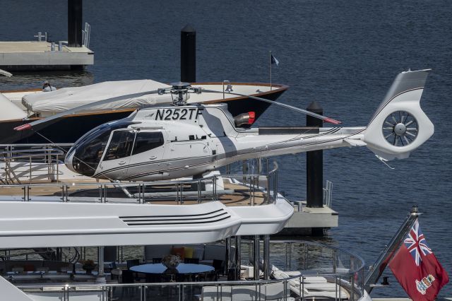 N152TF — - This H130 sits on the stern of Motor Yacht Feadship 'Boardwalk'. Image at The Town of Palm Beach Marina