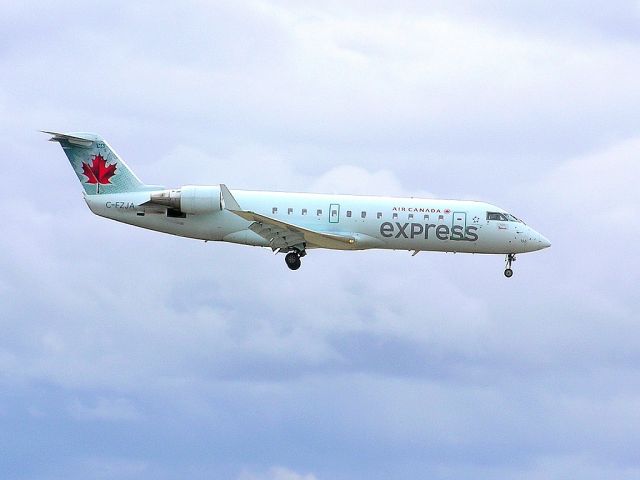 Canadair Regional Jet CRJ-200 (C-FZJA) - Landing 06L - April 27, 2014