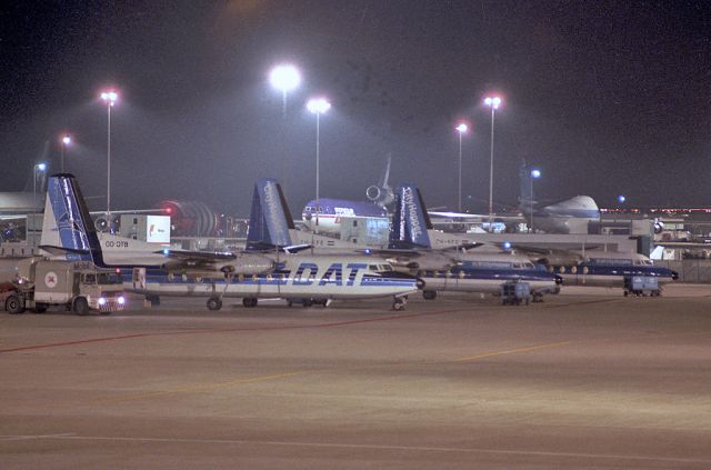 OO-DTB — - SCAN of Fuji Slide - at Amsterdam 1985-09-29. Also parked Fokker F27 Friendship PH-KFE and PH-KFB of NLM CityHopper.