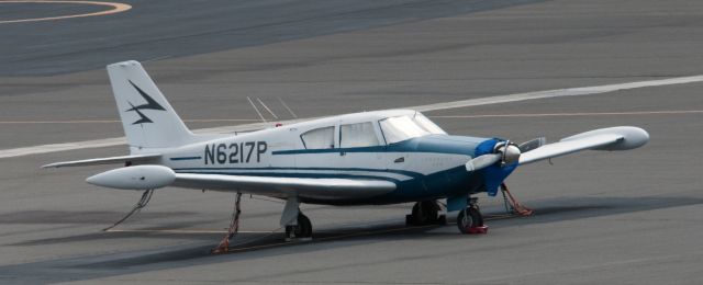 Piper PA-24 Comanche (N6217P) - This morning while walking my dog I was able to snap this picture of the aircraft parked at El Aero.