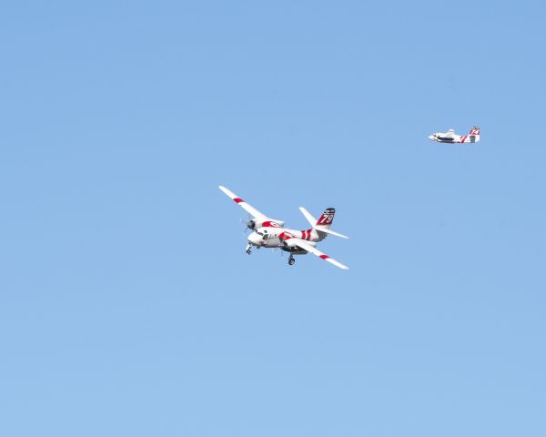 Beechcraft Baron (58) (N458DF) - CalFire Tanker 79 turns base to final at Paso Robles, Ca to take on another load of retardant while Tanker 74 exits the pattern with a fresh load for the Mineral Fire in western Fresno County