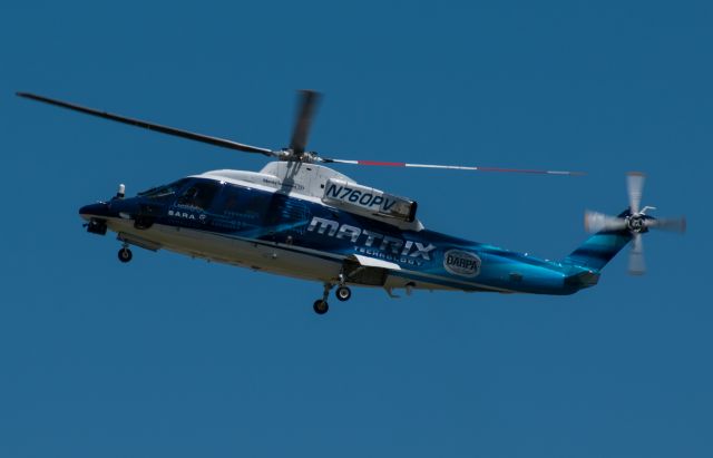 Sikorsky S-76 (N760PV) - N760PV hovering over the ramp at KPOU