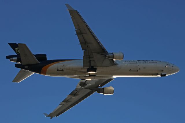 Boeing MD-11 (N275UP) - UPS9651 climbing out from RWY 24R for Louisville Intl (KSDF) after a delay on Friday 8 Dec 2017.