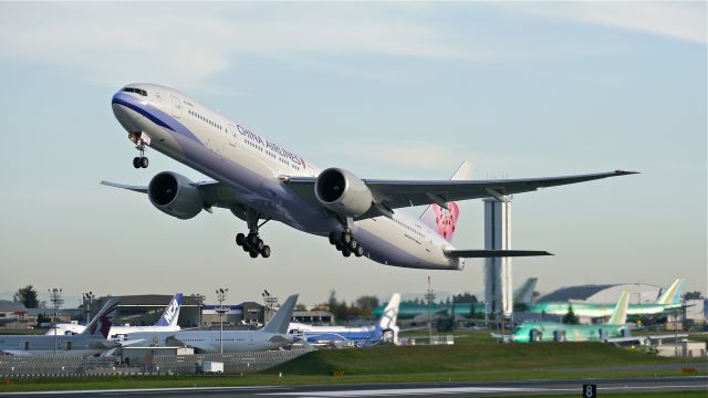 BOEING 777-300 (B-18051) - CAL1710 on rotation from Rwy 34L for delivery to RCTP / TPE on 10/3/14. (LN:1227 / cn 41821).