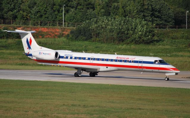 Embraer ERJ-145 (N683AE) - In position and holding runway 18C - 9/27/09