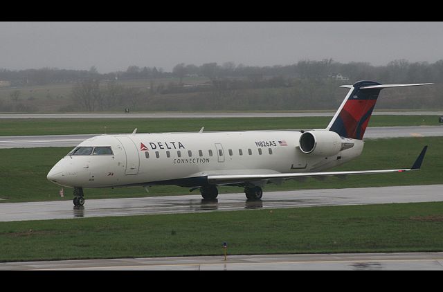 Canadair Regional Jet CRJ-200 (N826AS) - A rainy April afternoon in Des Moines.