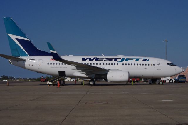 Boeing 737-700 (C-GWBF) - WJA2710 at the gate.