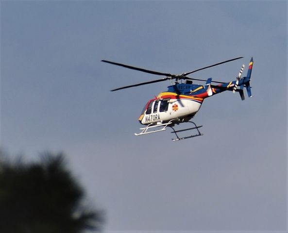 Bell 407 (N470RA) - N470RA, 11-1-2020, 1537.  From a house SE of the Kerrville, Texas Airport. 