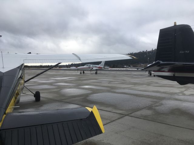 Cessna Skywagon (N9802X) - Standing behind N9802X on the runway apron.