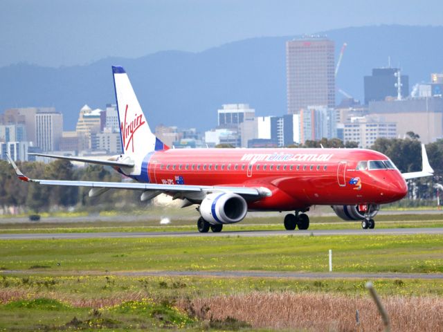 Embraer ERJ-190 (VH-ZPC) - On taxi-way heading for take off on runway 05. Thursday 12th July 2012.