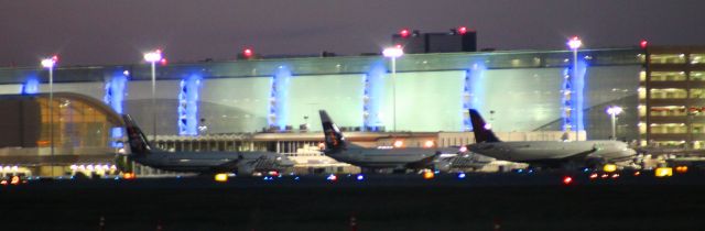 KSJC — - Terminal B amd New Rental Car Garage and Parking (with Blue lights) Alaska Airlines, First two from left, Delta Airlines far right.