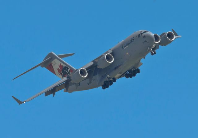 Boeing Globemaster III (17-7704) - Doing a flyby over the Canadian War-bird Heritage Museum  dedicating this years theme to the men and women of the RCAF. In conjunction with this years celebration to Canadas 150th birthday a giant motif of the Canadian Flag was em-brazen on the tail as well as a giant bison celebrating 429 sq service from 1942 to the present. 