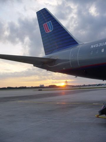 BOEING 737-400 (N453UAL) - Taken on the ramp at sunset