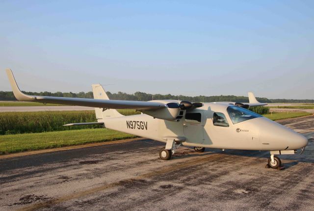 TECNAM P-2006T (N975GV) - A unique aircraft sighting for me. This Costruzioni Aeronautiche Tecnam P2006T was parked at TOL Airport on 26 Jul 2019. The company is based in Capua, Italy and has various facilities in 65 countries worldwide, including, Tecnam USA, Sebring, FL.