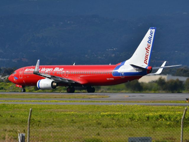 Boeing 737-800 (VH-VOX) - On taxi-way heading for take off on runway 05. Thursday 12th July 2012.