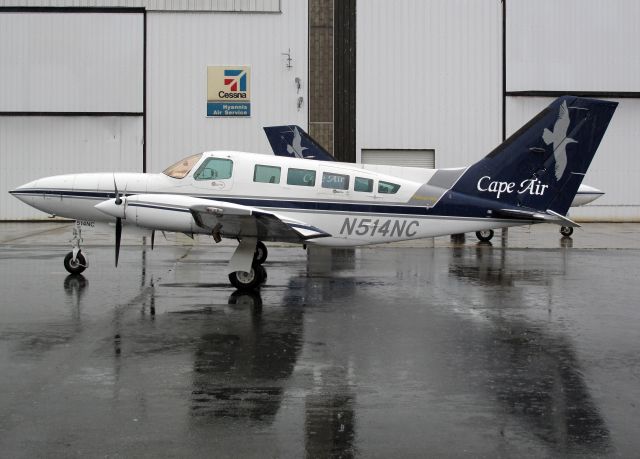 Cessna 402 (N514NC) - Another rainy day at the Cape.