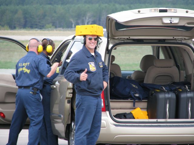 — — - Blue Angel crew member in cheese head during keau airshow. Go Packers!!!