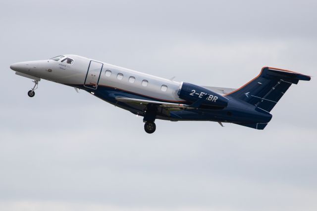 Embraer Phenom 300 (2-EMBR) - Embrear EMB-505 Phenom 300 Registration 2-EMBR (ICAO24 43ED51). Airborne after take off from Manchester Airport Airport 26th March 23.