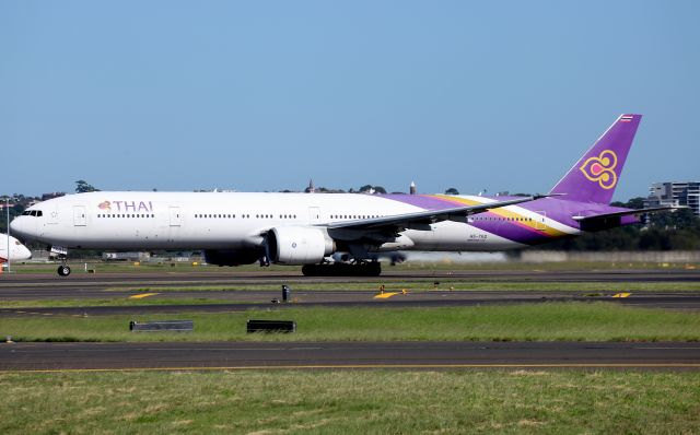 BOEING 777-300ER (HS-TKQ) - Lifting Off from Rwy 16R
