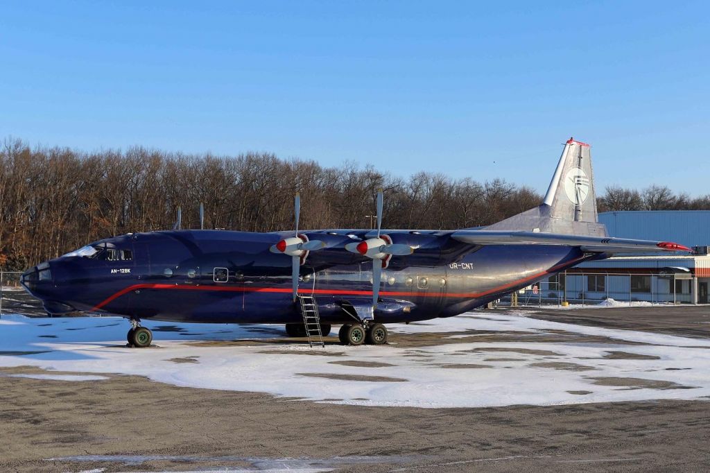 Antonov An-12 (UR-CNT) - A Ukraine Air Alliance AN-12BK still in Toledo three days after it and its crew arrived. I hope and pray they can return home to their families.