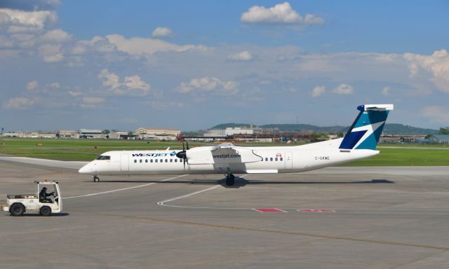 de Havilland Dash 8-400 (C-GKWE) - WestJet Encore De Havilland Canada DHC-8-402Q Dash 8 C-GKWE in Montreal