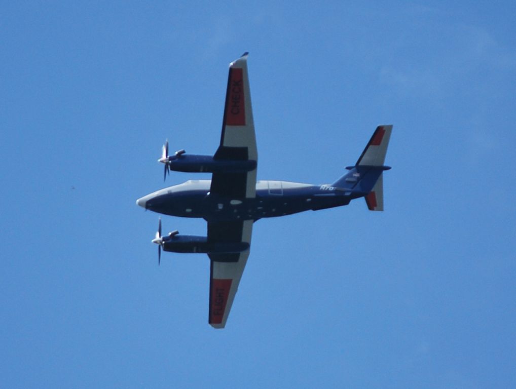 Beechcraft Super King Air 200 (N70) - FEDERAL AVIATION ADMINISTRATION flying over downtown Statesville, NC (KSVH) at lunch time - 7/10/13