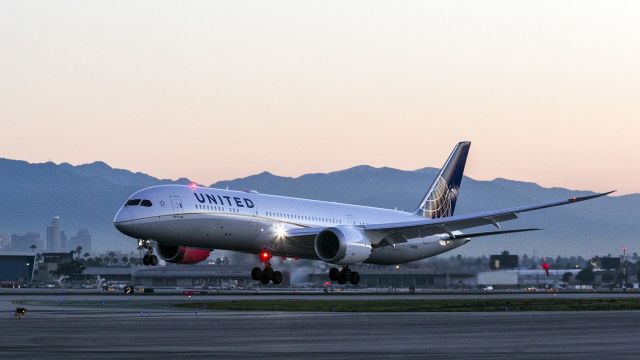 Boeing 787-9 Dreamliner (N19951) - This Dreamliner is landing on runway 25L at LAX, Los Angeles, California USA. Downtown Los Angeles is visible to the left. Photo taken at 06:52 AM, 14 January 2015