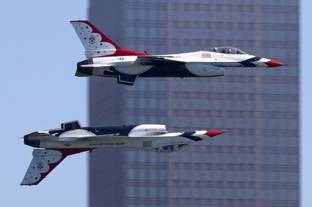 Lockheed F-16 Fighting Falcon — - USAF Thunderbirds #5 & #6 (lead & opposing solo's, passing by downtown during the Cleveland National Air Show on 2 Sept 2019 as seen from Lake Erie. 