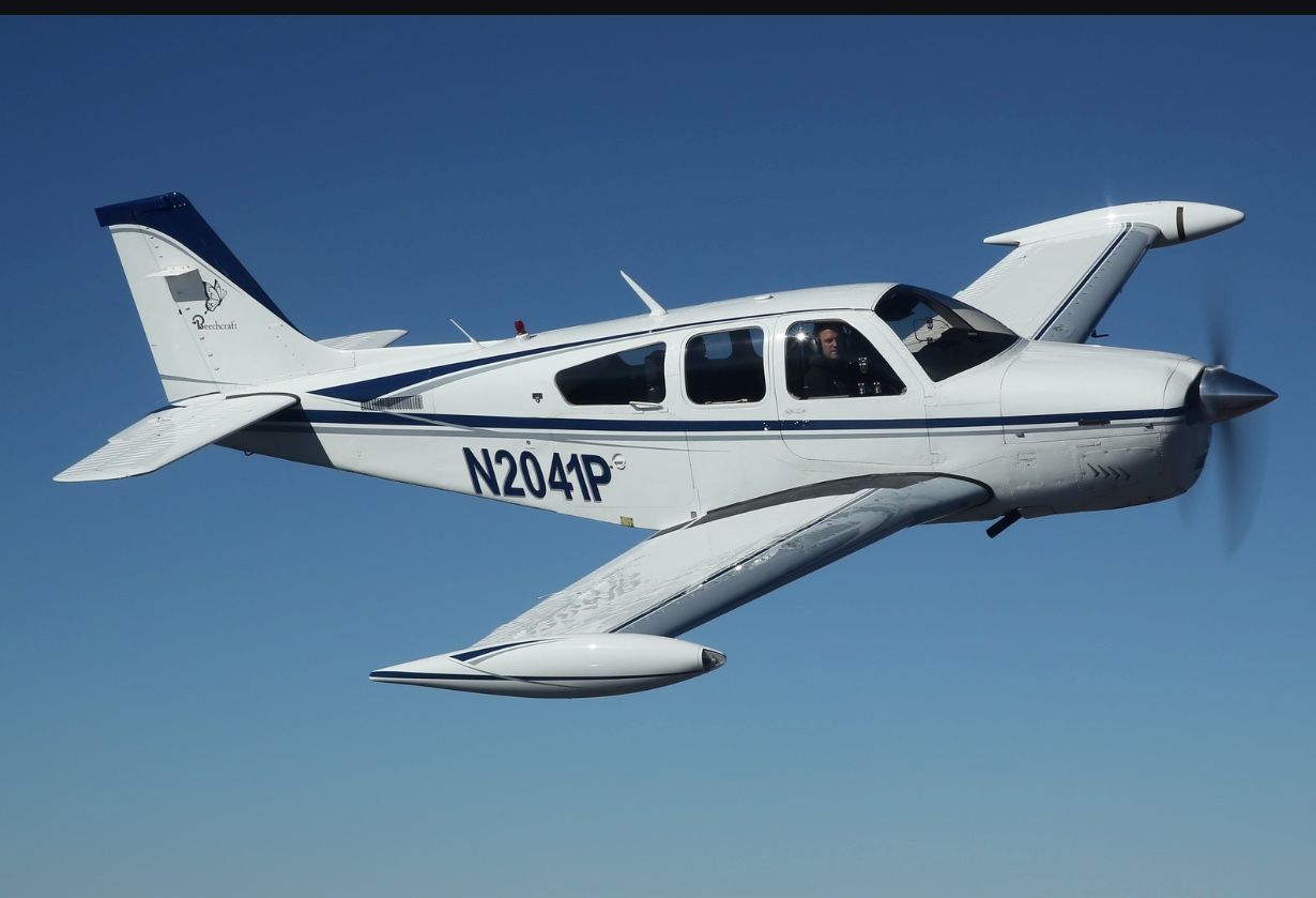 Beechcraft Bonanza (33) (N2041P) - Formation flying.