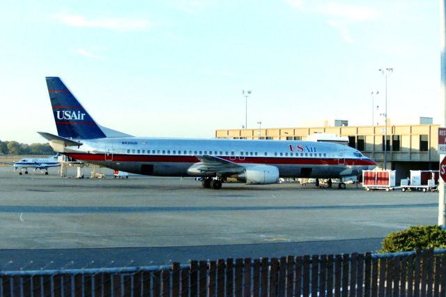 BOEING 737-400 (N435US) - KSMF - this is my first photo of a Boeing 737-400 taken at SMF Sacramento Intl in the very early 1990s as most west coast airlines did not fly the 737-400 except Alaska. Little did I know until today 11/20/24 that this 737-4 was the last 737-400 flight for US Airways and was withdrawn from service 8/20/2014 and parked at KGYR. The last revenue flight is posted as 8/19/2014 CLT-DFW-PHL-CLT