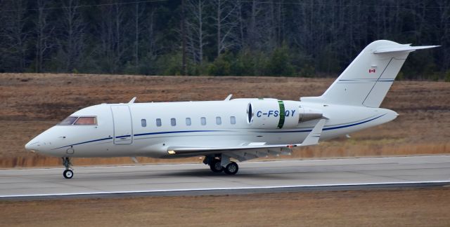 Canadair Challenger (C-FSQY) - A brand new CL-600 from parts unknown (couldnt track it). Still owned by Bombardier though, so that might give a hint. At a foggy RDU observation deck, 2/10/18.