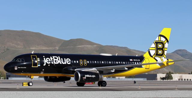 Airbus A320 (N632JB) - JetBlue's "Bear Force One," wearing the special paint of Beantown's Boston Bruins, taxies north on Alpha toward the terminal after completing a dinner-hour flight from LAX.br /* Now HERE is a LIVERY! I'll bet this beauty infuriates the fans of every other NHL city when it stops in for a visit. This one GLOWS! Well done, JetBlue! *