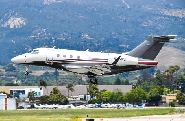 Embraer Legacy 450 (N414FX) - N414FX landing on runway 25 at Santa Barbara from Oakland.