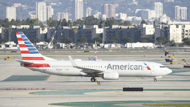 Boeing 737-800 (N883NN) - Taxiing to gate at LAX