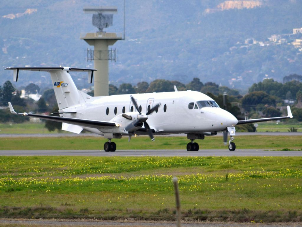 Beechcraft 1900 (VH-YOA) - On taxi-way heading for take off on runway 05. Thursday 12th July 2012.