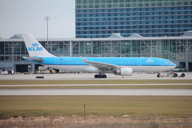 Airbus A330-200 (PH-AOE) - Spotting by 26R/08L. Pushing back, ready to depart to Amsterdam.