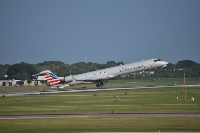 Canadair Regional Jet CRJ-900 (N950LR) - 8/7/2016: American Eagle CRJ-900 departing Runway 22 at KHOU.