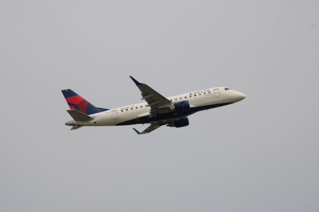 Embraer 170/175 (N810MD) - Delta Embraer 170 departing 36R, built in 2004. Purchased after the fall of Midwest Airlines.