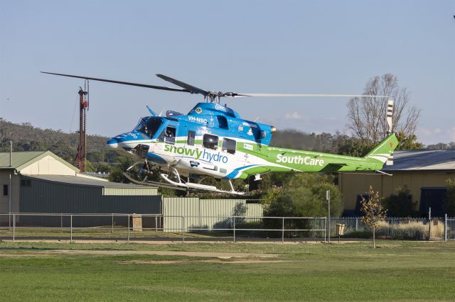 Bell 412 (VH-NSC) - SnowyHydro SouthCare (VH-NSC) Bell 412 departing the Duke of Kent Oval Helipad.