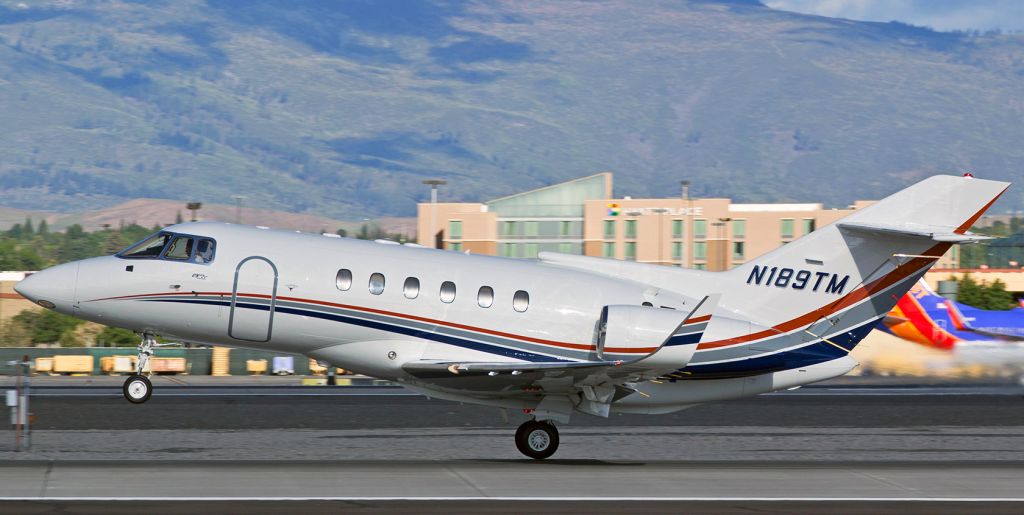 Hawker 800 (N189TM) - N189TM rotates away from Reno Tahoe Internationals runway 16L just as it streaks past my spotting location on taxiway Charlie.br /* For better Q, I recommend viewing the actual photo (FULL) instead of the thumbnail sizes. *