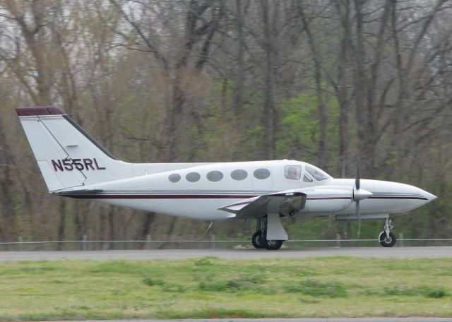 Cessna 421 (N55RL) - Rolling down runway 14 at the Shreveport Downtown airport.