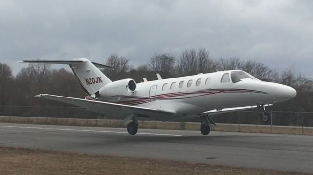 N20JK — - 2002 Cessna Citation CJ2 departing Mountain View on an overcast day