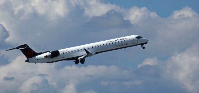 Canadair Regional Jet CRJ-900 (C-FJQZ) - Shortly after departure is this 2021 Air Canada Mitsubishi Canadair Regional Jet 900LR in the Spring of 2024.