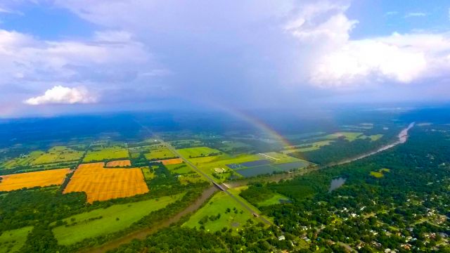 — — - flying past a rain storm over Southeast Kansas. 