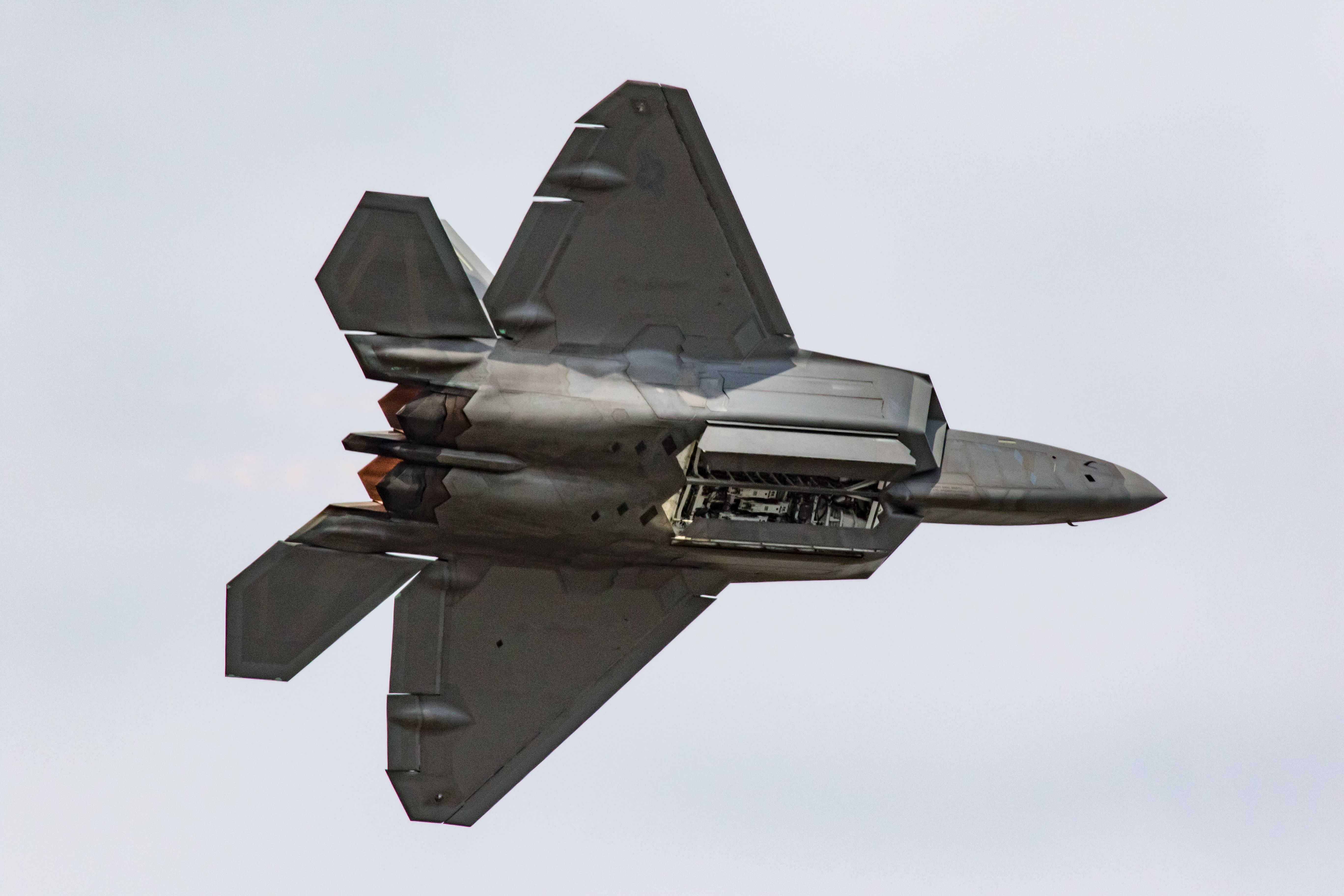 Lockheed F-22 Raptor (AALF09190) - F-22 in flight at Arctic Thunder at Elmendorf AFB, Alaska. July 31, 2016. Tail number 09-190. Weapons bay doors closing.