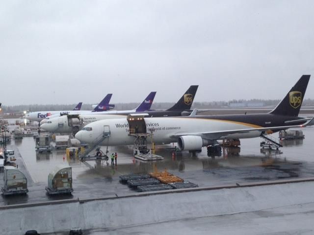 BOEING 767-300 (N305UP) - Busy day for UPS and FedEx at the airports cargo stand. Each are being prepared to fly to Memphis, Louisville, Oakland, Portland, and Indianapolis respectively.