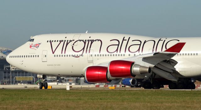 — — - Lining up on runway 027L at LHR.