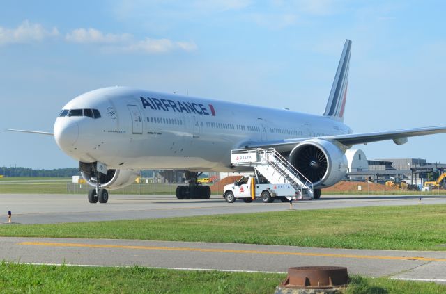 BOEING 777-300ER (F-GSQD) - I think we are going to need a bigger staircase!!